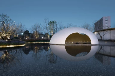 XISUI Design creates serene woven metal pavilion inspired by bird nest and eggshell structures XISUI Design creates serene woven metal pavilion inspired by bird nest and eggshell structures